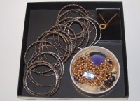 Lot 284 - A collection of assorted ladies steel bangles;...