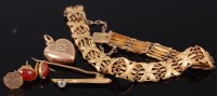 Lot 310 - A yellow metal X link bracelet apparently...