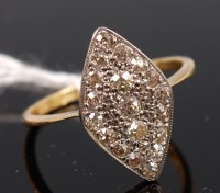 Lot 321 - An 18ct gold diamond dress ring, the navette...