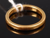 Lot 323 - A 22ct gold wedding band 4.2g size K/L