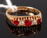 Lot 324 - A ladies 18ct gold ruby and diamond dress ring,...