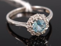 Lot 327 - A modern 18ct gold aquamarine and diamond set...