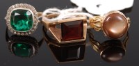 Lot 330 - A modern 9ct gold garnet set dress ring,...