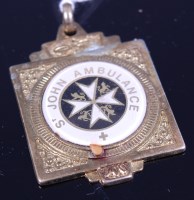 Lot 335 - A gilt metal St John's Ambulance badge