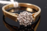 Lot 338 - An 18ct gold and small diamond set flowerhead...