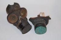 Lot 350 - A WWII ARP gas mask, dated 1943, in canvas bag...