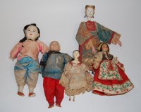 Lot 355 - A mid-20th century Indonesian doll; together...