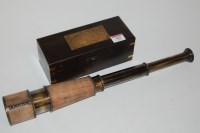 Lot 361 - A reproduction brass and leather clad...