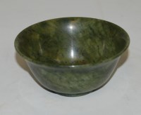 Lot 233 - A small nephrite jade shallow bowl, dia. 7.5cm
