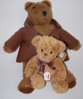 Lot 428 - A child's soft toy in the form of a bear...