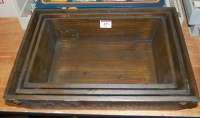 Lot 433 - A graduated set of three painted wooden trays,...