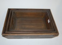 Lot 447 - A graduated set of three wooden trays, each...