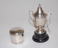 Lot 236 - A late Victorian silver dressing table jar, of...