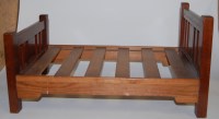 Lot 469 - An Edwardian mahogany dolls bed