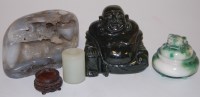 Lot 248 - A Chinese polished hardstone carving, showing...