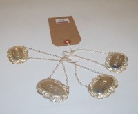 Lot 250 - A set of four modern silver decanter labels,...