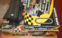 Lot 411 - A boxed Scalextric Formula One set together...