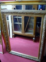 Lot 1090 - A large modern gilt framed bevelled...