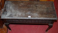Lot 1097 - An early 20th century low relief carved oak...