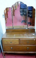 Lot 1101 - A 1930s mahogany triptych mirror back dressing...