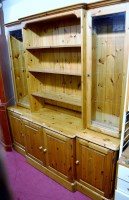 Lot 1104 - A modern pine round cornered dresser having...