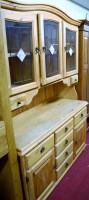 Lot 1107 - A modern pine kitchen dresser having three...