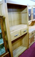 Lot 1108 - A contemporary light oak freestanding open...