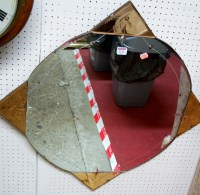 Lot 1111 - An Art Deco engraved wall mirror having peach...