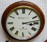 Lot 1112 - A mahogany circular wall clock, the white...