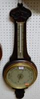 Lot 1113 - A mid 20th century carved oak two dial aneroid...
