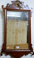 Lot 1116 - A circa 1900 mahogany fret carved wall mirror,...