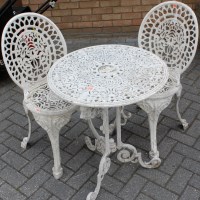Lot 1121 - White painted pierced metal circular garden...