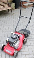 Lot 1123 - A Sovereign petrol driven lawnmower with grass...