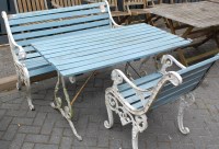 Lot 1128 - A painted cast metal ended and teak slatted...