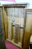 Lot 1140 - A modern stained pine freestanding bookshelf...