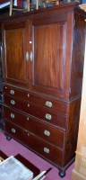 Lot 1144 - A 19th century mahogany secretaire cupboard...
