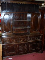 Lot 1145 - An 18th century oak dresser, the upper section...