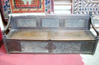 Lot 1147 - An early 20th century low relief carved oak...