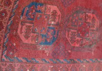 Lot 1151 - A Persian woollen Bokhara rug, the rust...