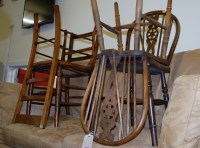 Lot 1161 - Two elm seat wheel back kitchen chairs,...