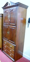 Lot 1163 - An American reproduction mahogany six door TV...