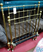 Lot 1169 - A Victorian turned brass single bed having...
