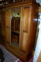 Lot 1173 - An Edwardian walnut single mirror door...