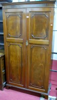 Lot 1179 - A mahogany and flame mahogany double door...