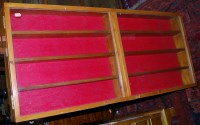 Lot 1229 - A stained pine double door glazed wall mounted...