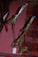 Lot 1232 - Three contemporary graduated metal heron...