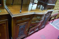 Lot 1236 - An Edwardian low relief carved walnut...
