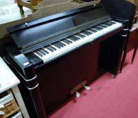 Lot 1247 - A 1930s ebonised Eavestaff pianette with...