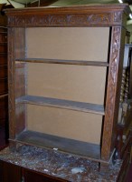 Lot 1248 - An early 20th century low relief carved oak...