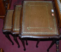 Lot 1255 - A reproduction mahogany and gilt tooled tan...